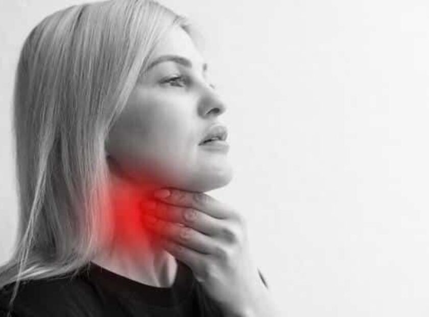 Throat Pain. Beautiful Woman Having Sore Throat, Feeling Sick. Unhappy Ill Female Suffering From Painful Swallowing, Strong Pain In Throat, Holding Hand On Her Neck. Health Concept. High Resolution.